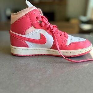 Women’s pink Jordan 1 mid
